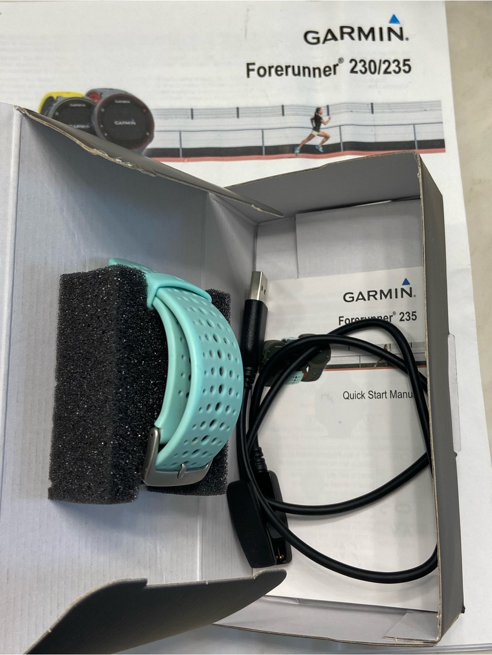 Garmin Forerunner 235 Black with Teal Accents and Band (in original box) - Picture 8 of 12